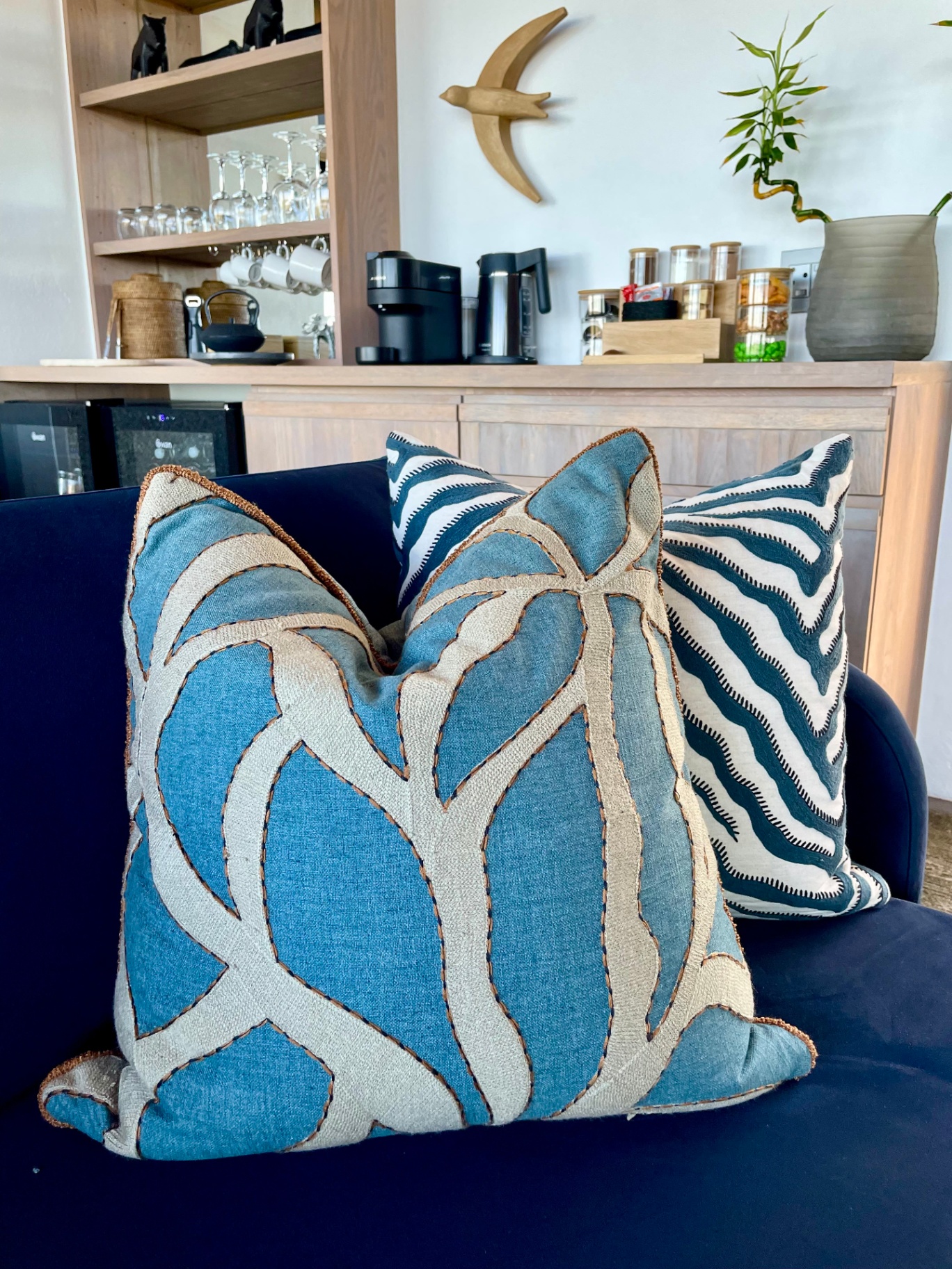 Appliqué and embroidered scatter cushions